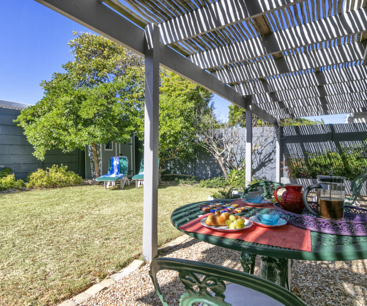 Lawn at 2 Bedroom Marina Da Gama Self Catering Accommodation In Muizenberg - Heron Cottage