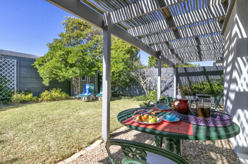 Lawn at 2 Bedroom Marina Da Gama Self Catering Accommodation In Muizenberg - Heron Cottage
